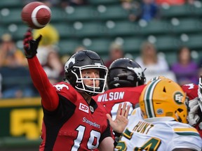 Calgary Stampeders quarterback Bo Levi Mitchell (19) airs out a pass against the Edmonton Eskimos during a preseason CFL game at Commonwealth Stadium in Edmonton, June 11, 2017.