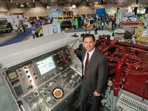 Postmedia Calgary

Shane Hooker, President and CEO of Sanjel Energy Systems, stands with one of the company's high tech trucks at the Global Petroleum show in Calgary on Tuesday June 13, 2017. Gavin Young/Postmedia Network
Gavin Young Gavin Young, Gavin Young