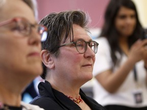 Canadian music icon k.d Lang listens to a performance by students at Memorial Park Library in Calgary. In celebration of Canada's 150th birthday, Sun Life Financial announced they are helping put more musical instruments into the hands of more Calgarians. Leah Hennel/Postmedia