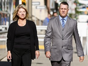 Terri Miller, president of the Alberta Association of Community Peace Officers, and past president Jamie Erickson speak to media at the fatality inquiry into the death of Rod Lazenby in Calgary on Monday, June 12, 2017.