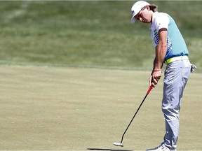 Brendan MacDougall putting during The Glencoe Invitational at The Glencoe Golf and Country Club in Calgary, Alta., on June 16, 2017.