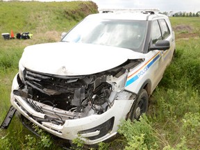 RCMP vehicle damaged during a pursuit near Raymond, Alta. on Wednesday.