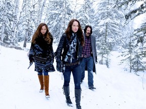 Dominique Provost-Chalkley, Melanie Scrofano and Tim Rozon in Season 2 of Wynonna Earp.