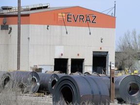 Workers at Evraz North America's Calgary operation have voted unanimously in favour of strike action.