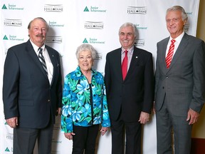 Newest members of the Calgary Business Hall of Fame: Bill Yuill (left), Jane Shouldice, Gerry Wood and Patrick Daniel. Jane Shouldice accepted on behalf of husband Pat.