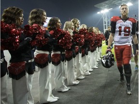 Calgary Stampeders quarterback Bo Levi Mitchell (19) walks off the field after losing in overtime to the Ottawa Redblacks during CFL Grey Cup action Sunday, November 27, 2016 in Toronto.