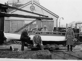 Alida Visbach, president and CEO of Heritage Park, details her family's experience in emigrating from Holland. Her father Frits (far left) sold this sailboat he built to pay his passage to Canada.