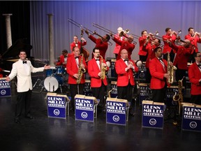 Nick Hilscher, the white tux, leads the Glenn Miller Orchestra.