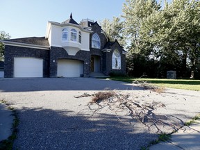 Estate homes sit empty like a ghost town in the Beachwood Estates area of the town of High River due to the 2013 flood on Tuesday June 20, 2017. DARREN MAKOWICHUK/Postmedia Network