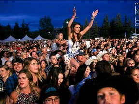 Fans cheer as Tim McGraw closes out day 2 of Country Thunder at Prairie Winds Park in Calgary in 2016.