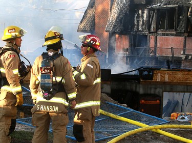 Fire crews battle a two-alarm blaze at  16 St. and 15 Ave. S.W. in the community of Sunalta Monday June 5, 2017 in Calgary, AB. DEAN PILLING/POSTMEDIA