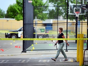 The scene of a shooting Saturday at a basketball court outside the Ernie Starr Arena in Forest Lawn.