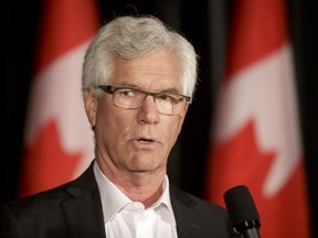 Minister of Natural Resources Jim Carr speaks with media during the federal Liberal cabinet retreat at the Fairmont Palliser in Calgary, Alta., on Tuesday, Jan. 24, 2017.