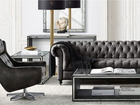 Mirrors and reflective furniture are both great for bouncing light around a space to make it appear larger. This Strand Mirrored Coffee Table from RH, Restoration Hardware is a perfect example, holding its own against dark upholstered pieces.