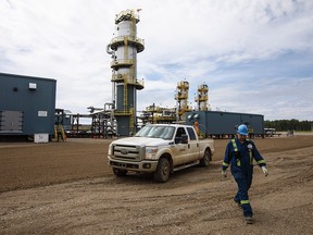 Suncor, manager, operations, MacKay River, Cary Walton walks around a group separator on a Suncor site in the oil sands in Fort McMurray on Monday June 12, 2017.