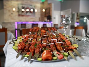 A plate of kabobs photographed at Calgary restaurant Afghan Kabob.