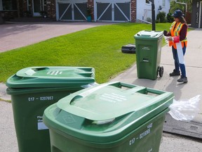 City crews deliver green carts to homes in Lakeview Village on Monday June 5, 2017. As the city wide rollout of the new composting program begins. Gavin Young/Postmedia Network