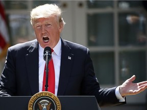 U.S. President Donald Trump announces his decision for the United States to pull out of the Paris climate agreement in the Rose Garden at the White House June 1, 2017 in Washington, DC. Trump pledged on the campaign trail to withdraw from the accord, which former President Barack Obama and the leaders of 194 other countries signed in 2015. The agreement is intended to encourage the reduction of greenhouse gas emissions in an effort to limit global warming to a manageable level.