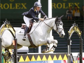 Rider Leslie Howard from the USA riding Donna Speciale wins the ENCANA Cup during the Spruce Meadows National in Calgary which runs from June 7 to the 11th on Friday June 9, 2017.