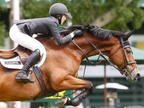 Rider Lucy Deslauriers from the USA riding Hester was the winner of the ATCO Challenge during the Spruce Meadows National on June 8, 2017.