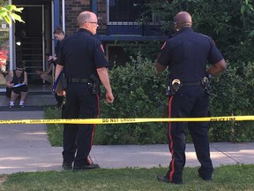 Police at the scene of a shooting in Sunalta on Tuesday June 27, 2017. Photo by Dean Pilling, Postmedia Network.