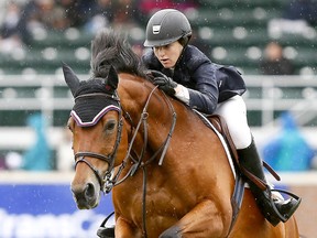 Rider Lucy Deslauriers from the USA riding Hester wins the TRANSCANADA Winning Round at the Spruce Meadows National in Calgary which runs from June 7 to the 11th on Saturday June 10, 2017. DARREN MAKOWICHUK/Postmedia Network