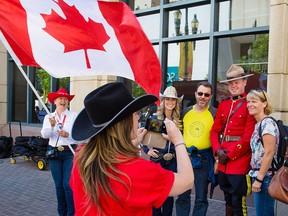 Calgary Stampede staff and Mounties were on hand along Stephen Avenue Mall over the lunch hour Tuesday to announce $1.50 gate admission on July 11.