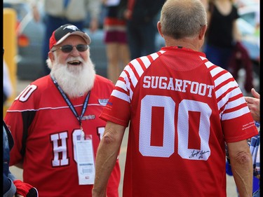 Calgary Stampeders fans gather outside McMahon Stadium before the team's home opener against the Ottawa Redblacks on June 29, 2017. The team honoured Stamps legend Sugarfoot Anderson at the game. Gavin Young/Postmedia Network