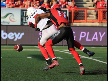 Ottawa Redblacks quarterback is sacked by the Calgary Stampeders Joshua Bell during the first half of CFL action against the Calgary Stampeders at McMahon Stadium in Calgary on Thursday June 29, 2017. Gavin Young/Postmedia Network