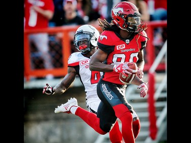 Calgary Stampeders Marken Michel with touchdown against the Ottawa Redblacks during CFL football in Calgary. AL CHAREST/POSTMEDIA