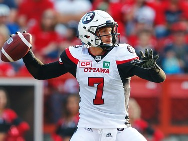 Ottawa Redblacks quarterback Trevor Harris looks to throw the ball against the Calgary Stampeders during CFL football in Calgary. AL CHAREST/POSTMEDIA