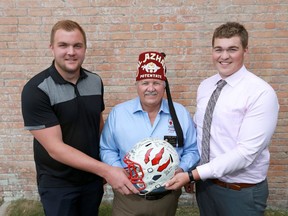 (L-R) Logan Bandy, St Francis High School, Al Azhar Shriners Potentate Karl Fraser and Tyler Packer, Notre Dame High School pose in Calgary on Wednesday June 28, 2017. The two lineman will travel to Montana to participate in an East-West Shrine football game. Jim Wells/Postmedia
Jim Wells, Jim Wells/Postmedia