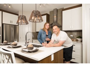 Travis and Jessie Hume in the Auburn Rise show suite by Logel Homes.
