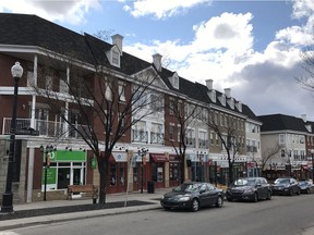 The multi-use development in Garrison Woods mixes street-level retail with condos above.