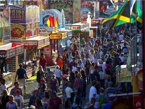 Crowds on the midway during Sneak-a-Peek at the Calgary Stampede on Thursday July 6, 2017. Leah Hennel/Postmedia

Stampede2017
Leah Hennel, Leah Hennel/Postmedia