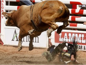 J.B. Mauney is injured coming off Cowabunga during bull riding championship at the Calgary Stampede,  Friday July 14, 2017.