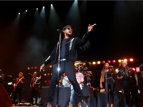 Usher performs at the Scotiabank Saddledome with The Roots on Saturday.