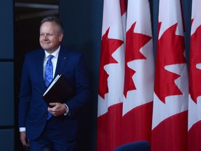 Bank of Canada Governor Stephen Poloz arrives at a press conference at the National Press Theatre in Ottawa on Wednesday, June 8, 2017. The Bank of Canada is sending out more signals that it's moving closer to a hike in its benchmark interest rate as the economy continues to strengthen. THE CANADIAN PRESS/Sean Kilpatrick ORG XMIT: CPT106