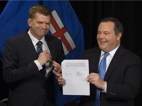 Brian Jean and Jason Kenney announce the merger of PCs and Wildrose on May 18, 2017.