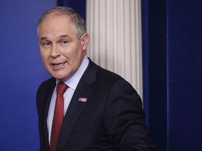 FILE - In this June 2, 2017, file photo, EPA Administrator Scott Pruitt looks back after speaking to the media during the daily briefing in the Brady Press Briefing Room of the White House in Washington. Records show Pruitt spent weekends in his home state during his first three months in office, frequently flying to and from Oklahoma at taxpayers expense. (AP Photo/Pablo Martinez Monsivais, File)