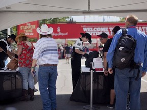 The Calgary Stampede is ramping up security this year, requiring random mandatory bag searches at entrances, employing full-time security 24-hours a day and using a video surveillance system. For Stampede story by Anna Junker. KERIANNE SPROULE/POSTMEDIA

Postmedia Calgary Stampede2017
Kerianne Sproule