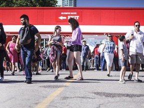 Stampede-goers enter the grounds on Thursday, July 13, 2017.