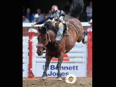 Colton Ouellette from Meadow Lake Saskatchewan rode Zaddick Joe to a score of 66 in the novice bareback event at the 2017 Calgary Stampede rodeo, Monday July 10, 2017.