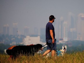 Smoke drifting in from B.C. wildfires hangs over downtown Calgary on July 17, 2018. The Weather Network is calling for more of the same this summer.