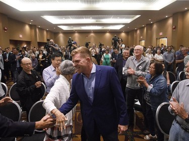 Wildrose leader Brian Jean celebrates the yes vote during the Unity Vote at the Wildrose Special General Meeting in Red Deer Alta, on Saturday July 22, 2017. THE CANADIAN PRESS/Jason Franson ORG XMIT: EDM108
JASON FRANSON,