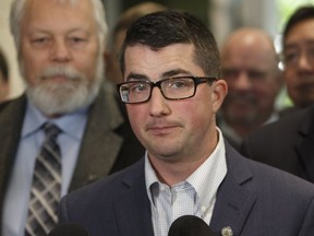 United Conservative Party interim leader Nathan Cooper speaks to media after the first meeting of the new United Conservative Party caucus in Edmonton on July 24, 2017.