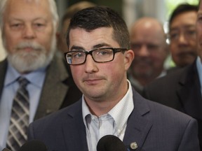 Nathan Cooper

United Conservative Party interim leader Nathan Cooper speaks to media after the first meeting the new United Conservative Party caucus in Edmonton Alta, on Monday July 24, 2017. THE CANADIAN PRESS/Jason Franson ORG XMIT: EDM107
JASON FRANSON,