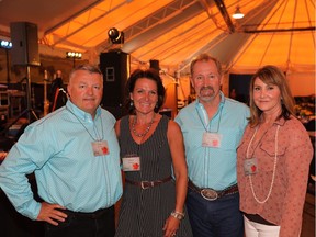 Cal 0722 Gibson 1 Pictured, from left at the Gibson Energy annual Stampede BBQ held July 10 at Heritage Park are, Gibson Chief Commercial Officer, Doug Wilkins, his wife Sharon Wilkins, Gibson CEO  Steve Spaulding, and his wife, Tami Spaulding. The fab event raised funds in support of the Alberta Adolescent Recovery Centre (AARC).
Courtesy Gibson Energy, Courtesy Gibson Energy