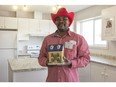 Claude Toge is one of the people who will be moving into a new set of fourplexes in Pineridge through Habitat for Humanity-Southern Alberta. A dedication event and Calgary Stampede breakfast was held last week.