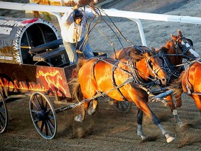 Logan Gorst driving for BD & P Put the Boots to Hunger in heat 7 during the GMC Rangeland Derby at the Calgary Stampede rodeo. AL CHAREST/POSTMEDIA